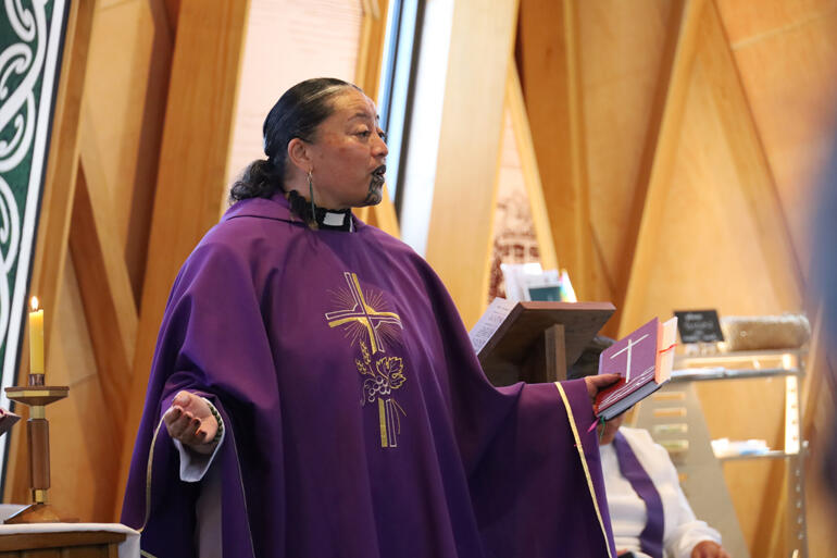 Bishop-elect Susan Wallace presides at the Eucharist in Te Whare Hononga a whare wānanga of Ngāti te Whiti and Taranaki Cathedral.