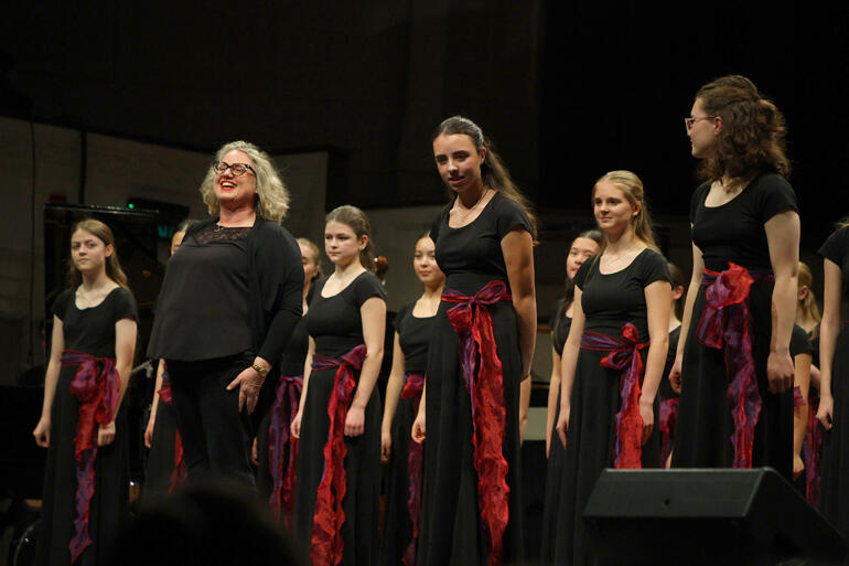 Director Maria Colvin and Bel Suono singers from Waikato Diocesan School for Girls receive their rapturous applause.