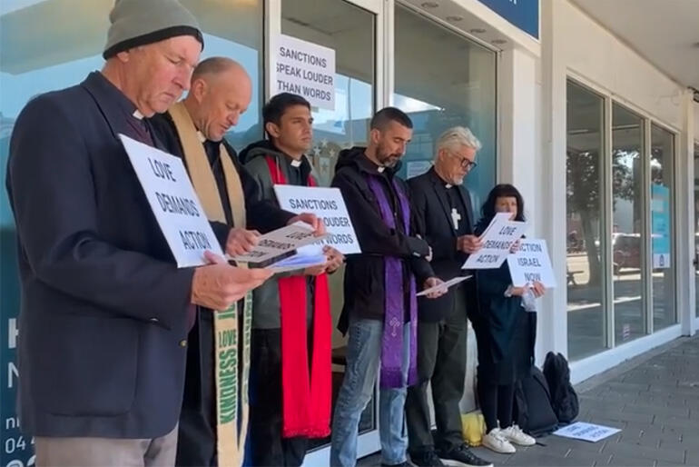 L-R: Msgr Gerard Burns, Rev Andy Hickman, Rev Chris Kirby, Rev Paul Fletcher, Rev Martin Robinson and Rev Mel McKenzie at Nicola Willis' offices.